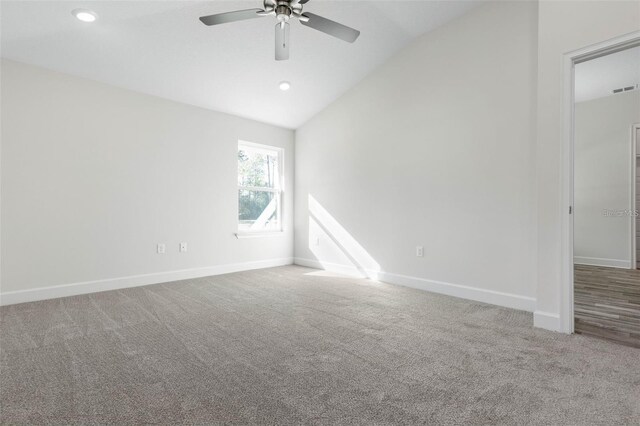 12 Wainshire Pl, Palm Coast, FL 32164 - empty room with a ceiling fan, carpet flooring, vaulted ceiling, and recessed lighting