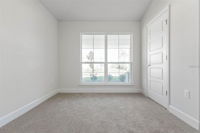 12 Wainshire Pl, Palm Coast, FL 32164 - carpeted spare room with baseboards