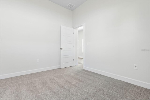 12 Wainshire Pl, Palm Coast, FL 32164 - carpeted empty room with baseboards