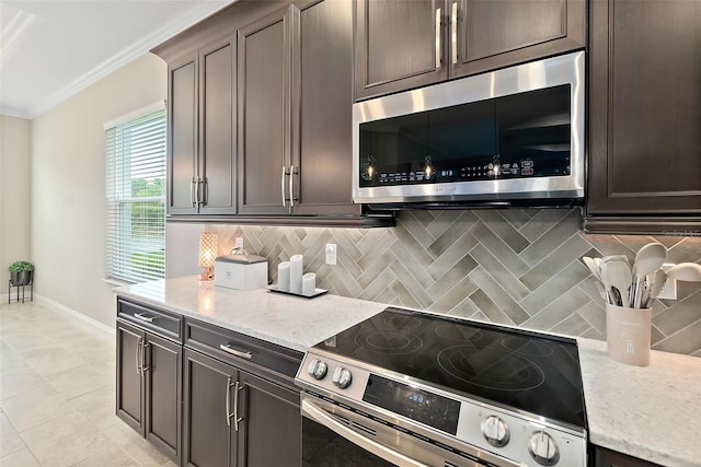 67 N Lakewalk Dr, Palm Coast, FL 32137 - kitchen with appliances with stainless steel finishes, backsplash, ornamental molding, dark brown cabinets, and light stone countertops