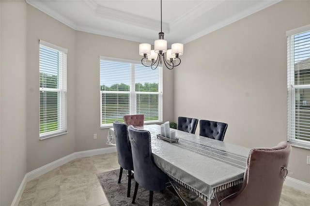 67 N Lakewalk Dr, Palm Coast, FL 32137 - dining room with a chandelier, ornamental molding, and a raised ceiling
