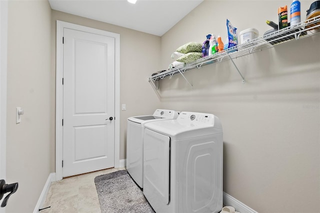 67 N Lakewalk Dr, Palm Coast, FL 32137 - washroom featuring separate washer and dryer and baseboards