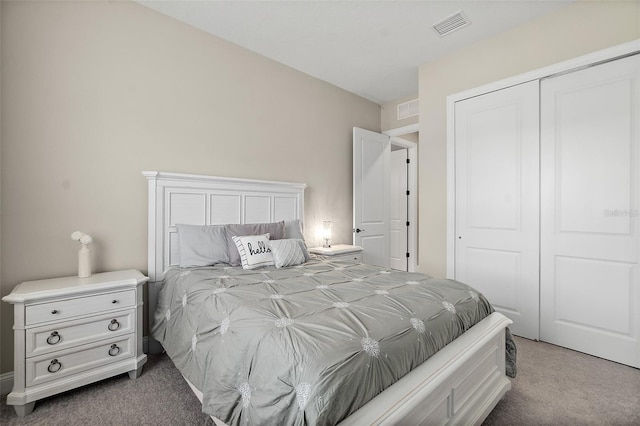 67 N Lakewalk Dr, Palm Coast, FL 32137 - bedroom with light carpet and a closet