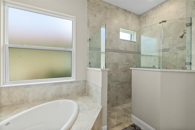 67 N Lakewalk Dr, Palm Coast, FL 32137 - bathroom with a bath and a walk in shower