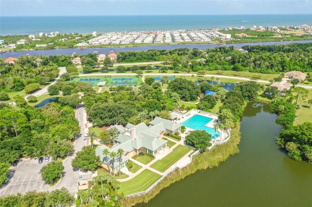 67 N Lakewalk Dr, Palm Coast, FL 32137 - drone / aerial view of a nearby body of water and a tree filled landscape