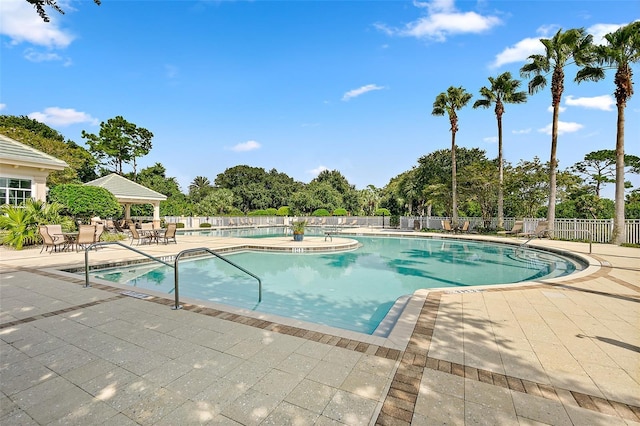 67 N Lakewalk Dr, Palm Coast, FL 32137 - community pool featuring a patio area and a gazebo