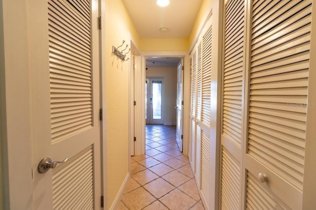 3000 Ocean Shore Blvd Unit 18, Ormond Beach, FL 32176 - hallway with light tile patterned flooring