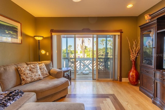 3000 Ocean Shore Blvd Unit 18, Ormond Beach, FL 32176 - living area featuring light wood-style flooring and recessed lighting