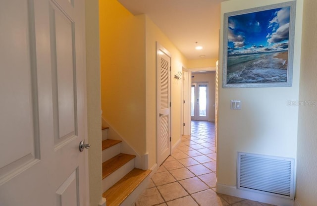 3000 Ocean Shore Blvd Unit 18, Ormond Beach, FL 32176 - hallway with light tile patterned flooring and baseboards