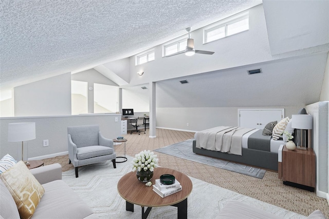 1115 N Central Ave, Flagler Beach, FL 32136 - carpeted bedroom featuring ceiling fan, high vaulted ceiling, and a textured ceiling
