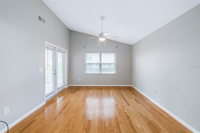 1115 N Central Ave, Flagler Beach, FL 32136 - empty room with lofted ceiling, light wood-style floors, and ceiling fan