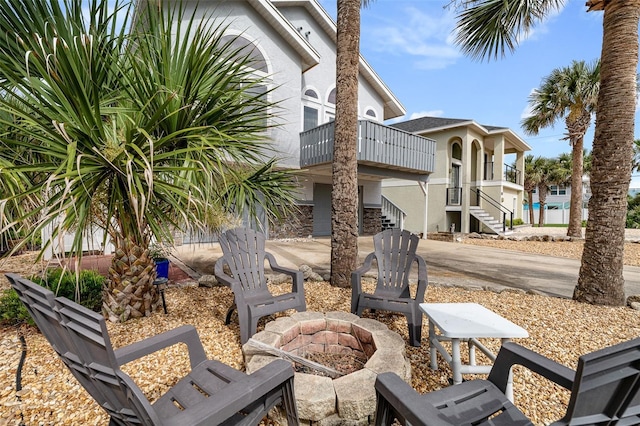 1115 N Central Ave, Flagler Beach, FL 32136 - patio / terrace with an outdoor fire pit, stairs, and a patio