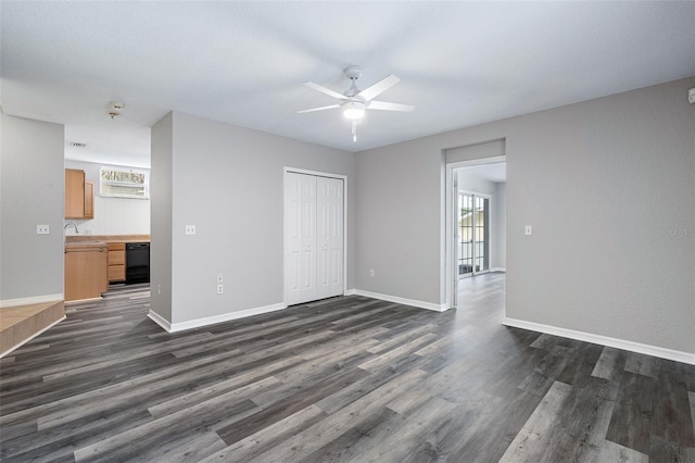 1115 N Central Ave, Flagler Beach, FL 32136 - unfurnished living room featuring dark wood finished floors and ceiling fan