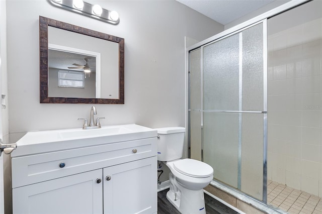 1115 N Central Ave, Flagler Beach, FL 32136 - bathroom with a stall shower, vanity, and a ceiling fan