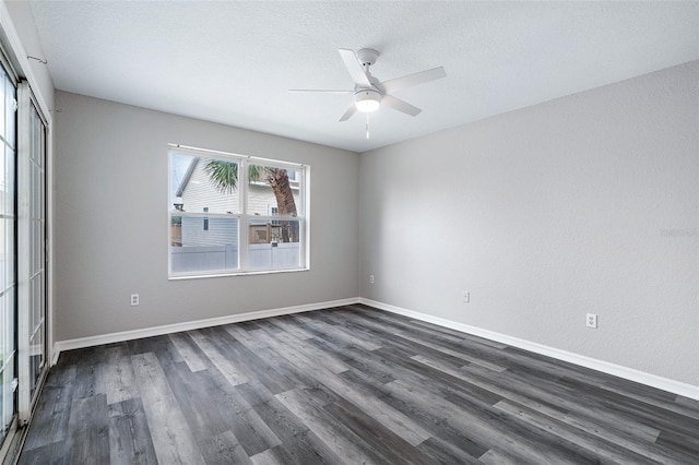 1115 N Central Ave, Flagler Beach, FL 32136 - unfurnished bedroom featuring dark wood-style flooring, ceiling fan, and a closet