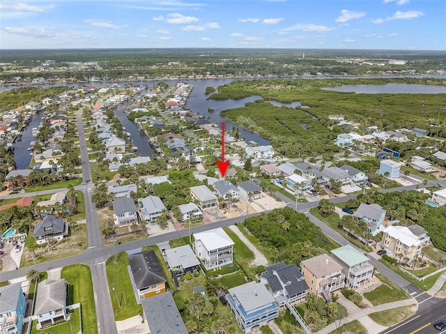 1115 N Central Ave, Flagler Beach, FL 32136 - aerial view of property and surrounding area with a large body of water and nearby suburban area