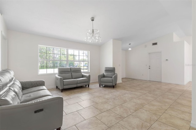 23 Pennfield Ln, Palm Coast, FL 32164 - living area featuring a chandelier, light tile patterned flooring, and vaulted ceiling