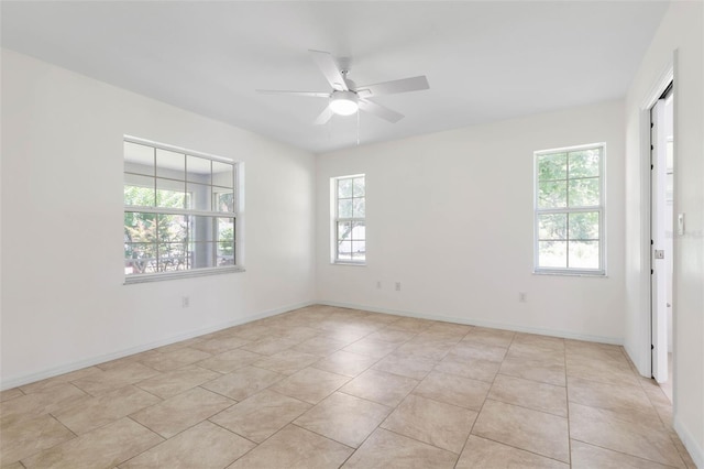 23 Pennfield Ln, Palm Coast, FL 32164 - empty room with ceiling fan and light tile patterned floors