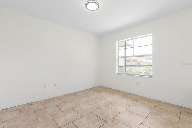 23 Pennfield Ln, Palm Coast, FL 32164 - unfurnished room featuring baseboards
