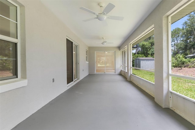 23 Pennfield Ln, Palm Coast, FL 32164 - unfurnished sunroom with ceiling fan and plenty of natural light