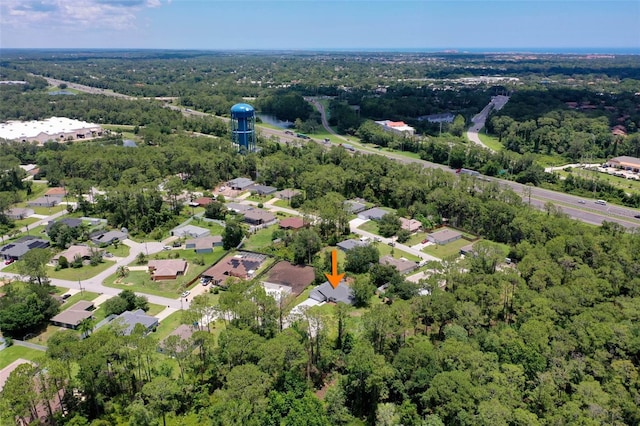 23 Pennfield Ln, Palm Coast, FL 32164 - aerial overview of property's location featuring a heavily wooded area