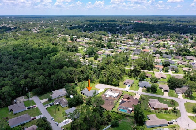 23 Pennfield Ln, Palm Coast, FL 32164 - aerial view of property's location featuring nearby suburban area and a forest