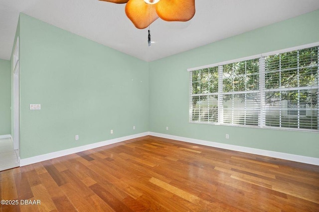 3132 Connemara Dr, Ormond Beach, FL 32174 - unfurnished room with wood finished floors and a ceiling fan