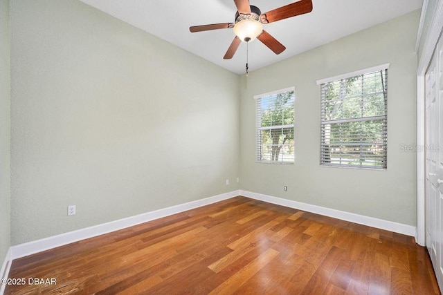 3132 Connemara Dr, Ormond Beach, FL 32174 - spare room featuring wood finished floors and ceiling fan