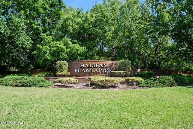 3132 Connemara Dr, Ormond Beach, FL 32174 - community / neighborhood sign with a yard