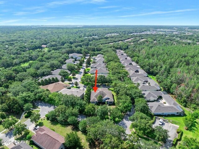 3132 Connemara Dr, Ormond Beach, FL 32174 - aerial overview of property's location with a forest and nearby suburban area