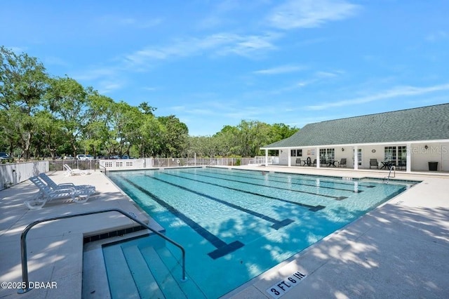 3132 Connemara Dr, Ormond Beach, FL 32174 - community pool with a patio area