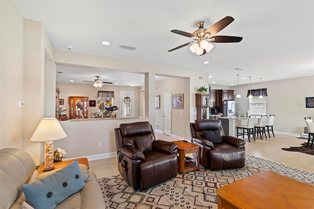 105 Spoonbill Dr, Palm Coast, FL 32164 - living area with ceiling fan, light tile patterned flooring, and recessed lighting