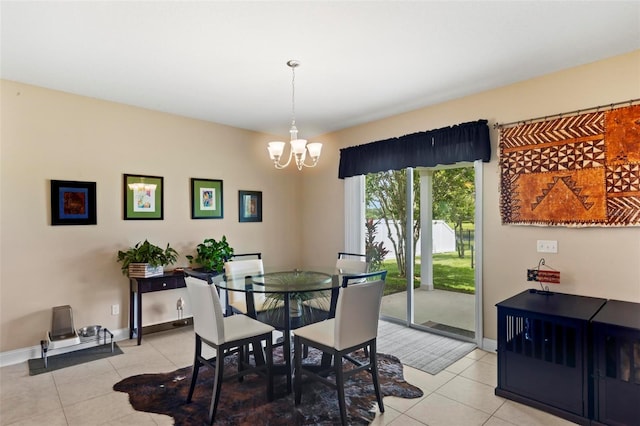 105 Spoonbill Dr, Palm Coast, FL 32164 - dining space with light tile patterned flooring and a chandelier