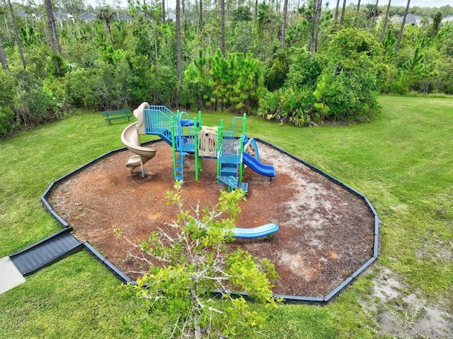 105 Spoonbill Dr, Palm Coast, FL 32164 - community playground featuring a lawn