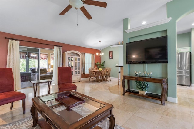 5 Senora Ct, Palm Coast, FL 32164 - living area featuring vaulted ceiling, a ceiling fan, arched walkways, a chandelier, and light tile patterned floors