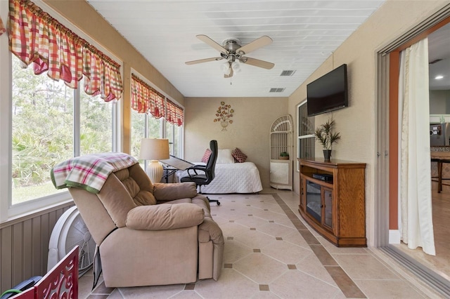 5 Senora Ct, Palm Coast, FL 32164 - sunroom with tile patterned floors, healthy amount of natural light, and a ceiling fan