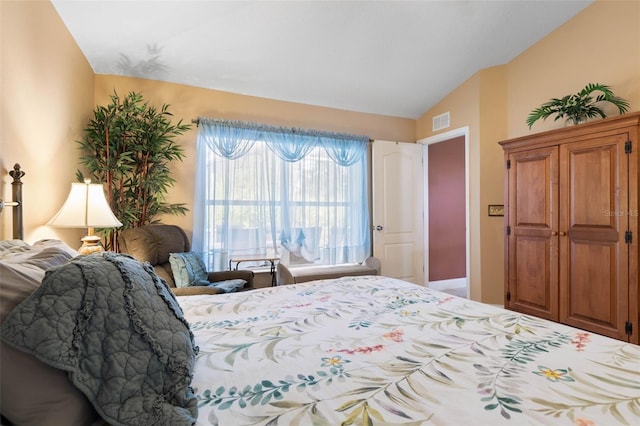 5 Senora Ct, Palm Coast, FL 32164 - bedroom featuring lofted ceiling