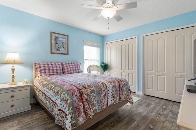 5 Senora Ct, Palm Coast, FL 32164 - bedroom featuring two closets, wood finished floors, and ceiling fan