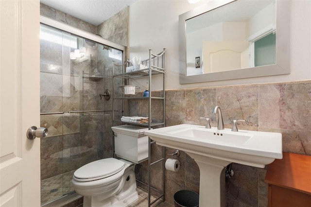 5 Senora Ct, Palm Coast, FL 32164 - full bathroom with tile walls, a stall shower, and a wainscoted wall