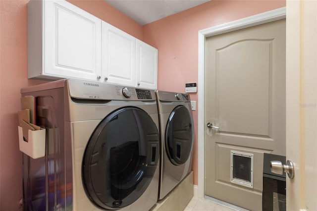 5 Senora Ct, Palm Coast, FL 32164 - laundry area with washer and dryer, cabinet space, and light tile patterned floors