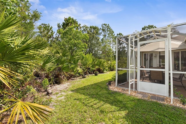5 Senora Ct, Palm Coast, FL 32164 - view of grassy yard with a lanai