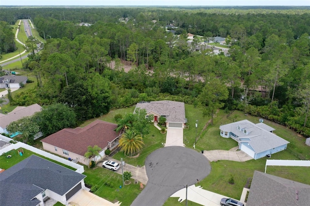 5 Senora Ct, Palm Coast, FL 32164 - aerial perspective of suburban area featuring a heavily wooded area