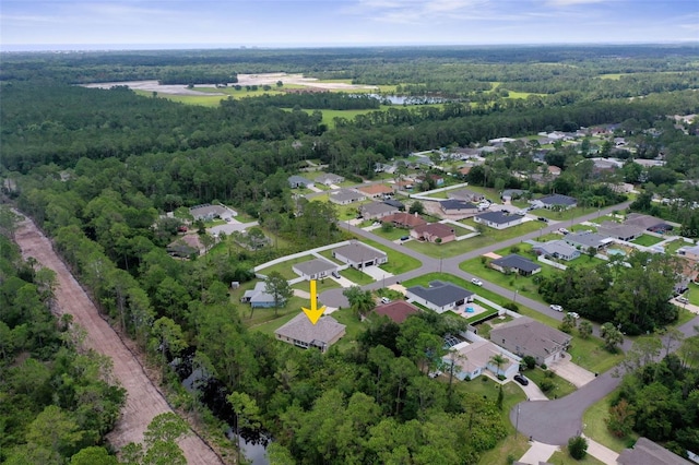 5 Senora Ct, Palm Coast, FL 32164 - aerial view of property's location with a heavily wooded area