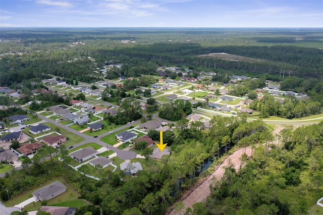 5 Senora Ct, Palm Coast, FL 32164 - aerial view of property and surrounding area with a forest and nearby suburban area