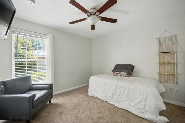 44 Edward, Palm Coast, FL 32164 - carpeted bedroom with baseboards and ceiling fan