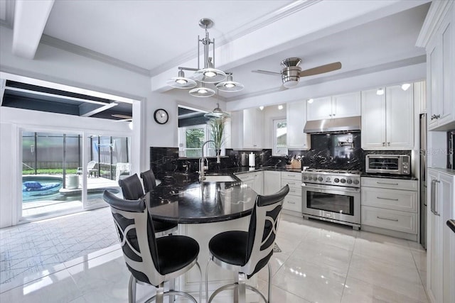 1108 Shockney Dr, Ormond Beach, FL 32174 - dining space with crown molding and a ceiling fan