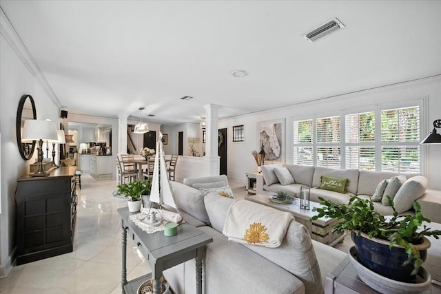 1108 Shockney Dr, Ormond Beach, FL 32174 - living room featuring ornate columns and crown molding