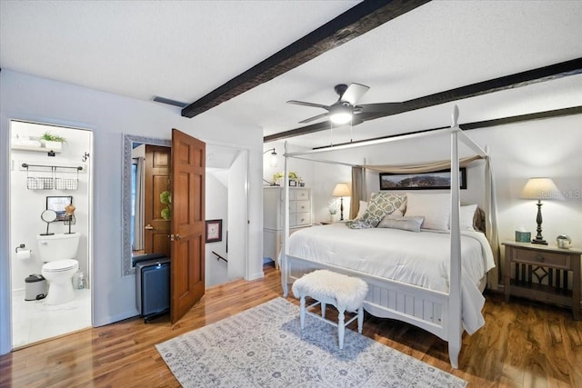 1108 Shockney Dr, Ormond Beach, FL 32174 - bedroom featuring beamed ceiling, wood finished floors, ensuite bathroom, and ceiling fan