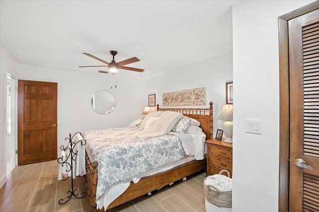 1108 Shockney Dr, Ormond Beach, FL 32174 - bedroom featuring wood finish floors, a ceiling fan, and a closet