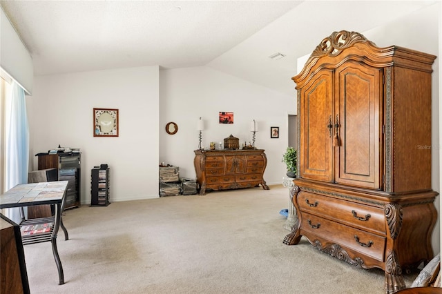 1 Ryberry Pl, Palm Coast, FL 32164 - carpeted bedroom with vaulted ceiling and baseboards